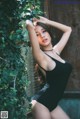 Beautiful Pichana Yoosuk shows off her figure in a black swimsuit (19 photos)